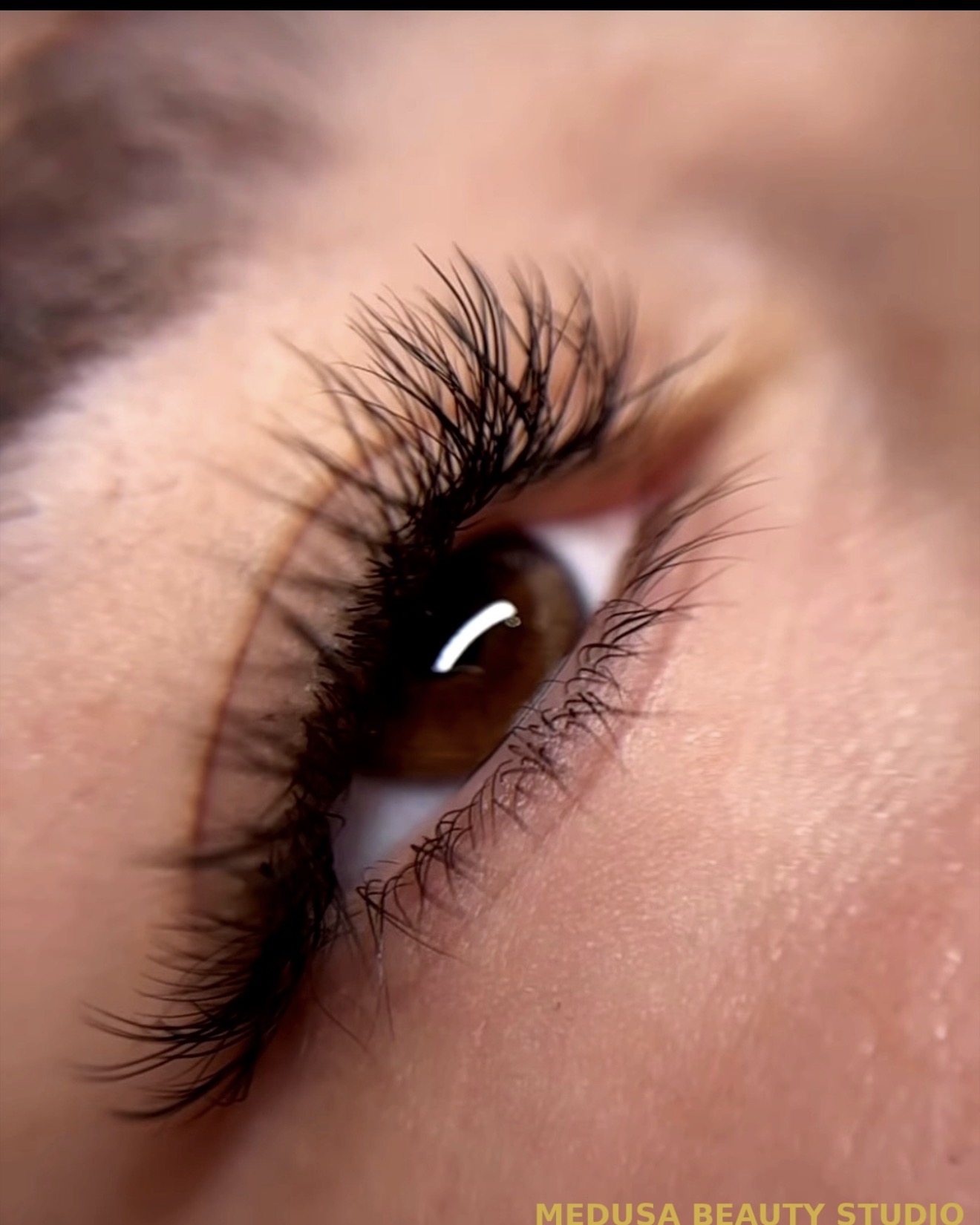 Close-up of a customized wet set lash result